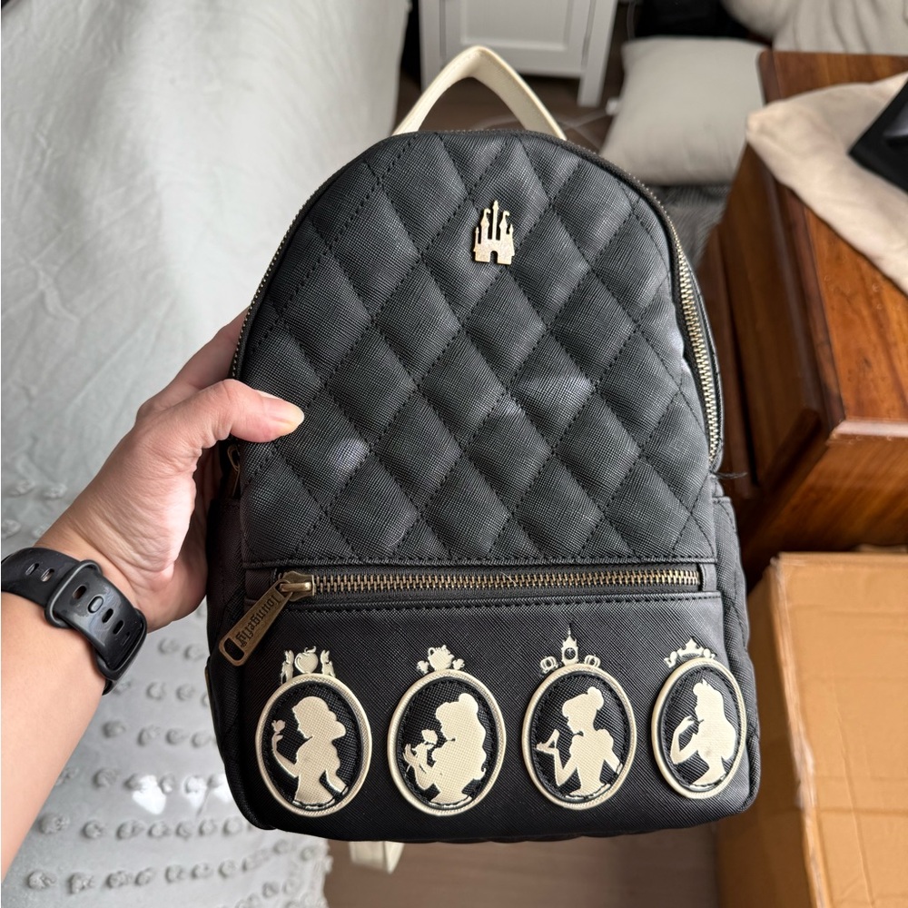 Black Quilted Backpack with Silhouette Design